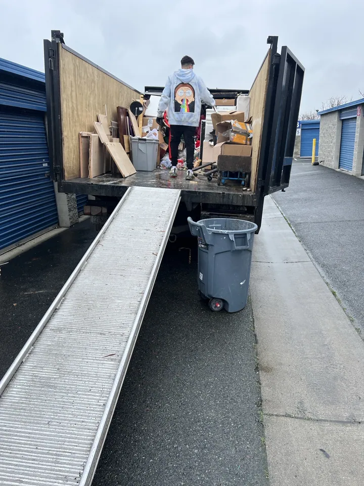 Loading by hand. The crew does the lifting, which is the whole point of calling.