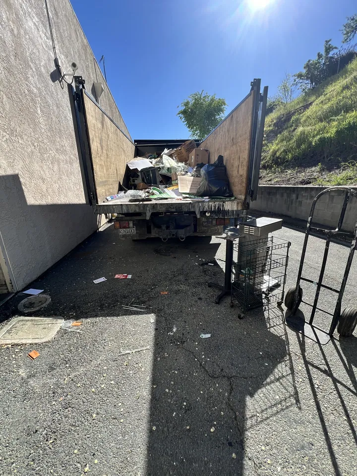 Ramp down, doors open, nothing left behind in the corner.